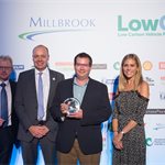 2016 Low Carbon Innovation by an SME - Tevva Motors. L-R Darran Messem - LowCVP Chair, Ian Constance - CEO APC (sponsors), Asher Bennett - Tevva, Nicki Shields, Awards MC.