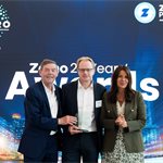 20th Anniversary Award recipient Darran Messem (c) with Zemo Chair Philip Sellwood  (l) and awards host Ginny Buckley (r)