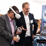 Delegates interact with VR on World Auto Steel and Ricardo's Steel E-Motive stand